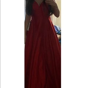 Long red prom dress from Macy’s bought it for $250selling it for $120.Size 2